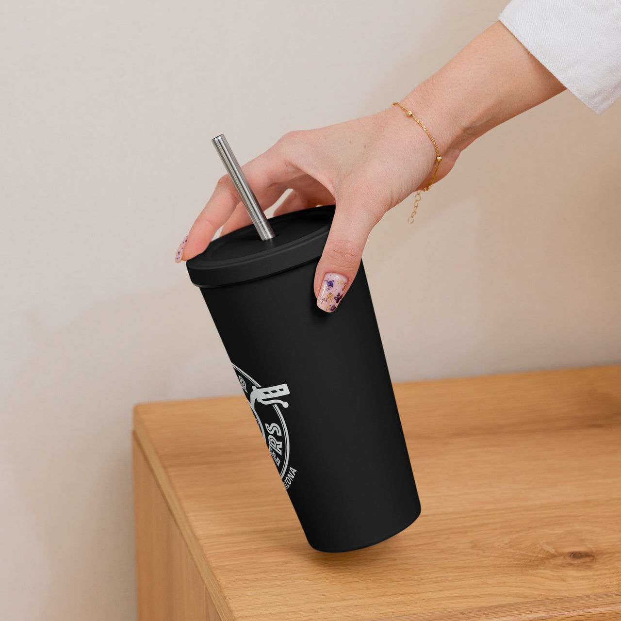 Insulated tumbler with a straw